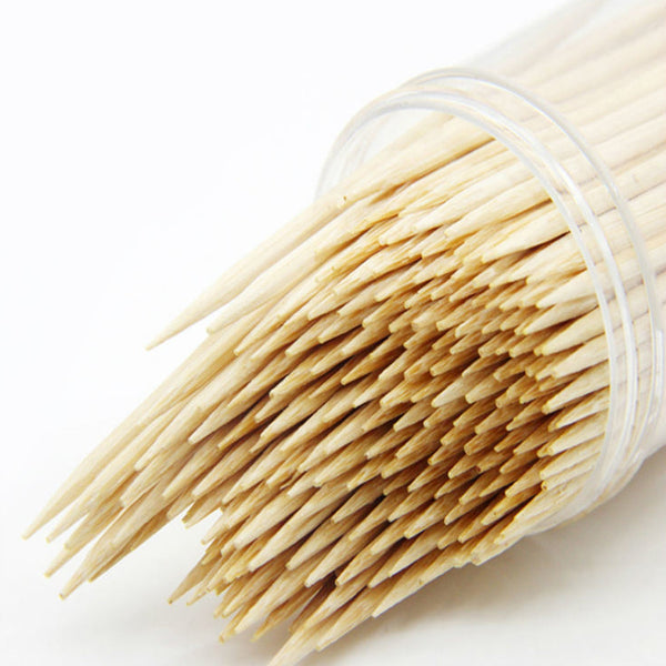 Wooden toothpicks in dispenser box