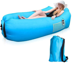 Inflatable lounger sofa in use at a campsite