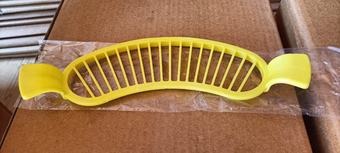 Banana slicer with handle for safe and efficient cutting.