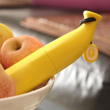 Foldable banana-shaped mini umbrella, compact and stylish.