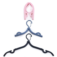 Multicolor plastic hanger, foldable for easy storage, great for keeping your clothes organized.