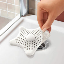 Star-shaped drain strainer to prevent clogs in pipes