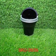 Compact multicolor car dustbin, ideal for use while traveling.